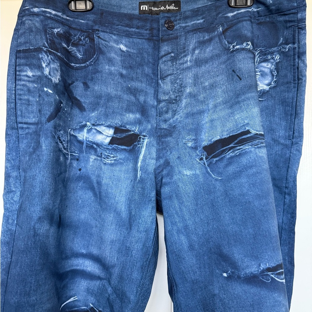 Travis Mathew Manowar Blue Distressed “Jean” Hybrid Shorts.